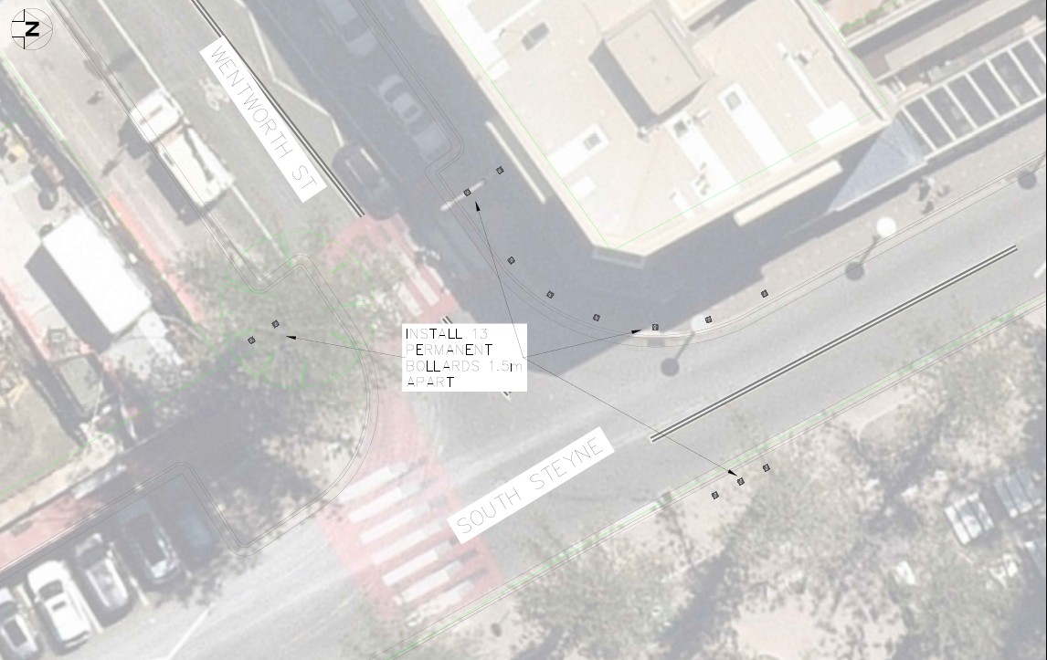 aerial view with arrows indicating where bollards will be installed