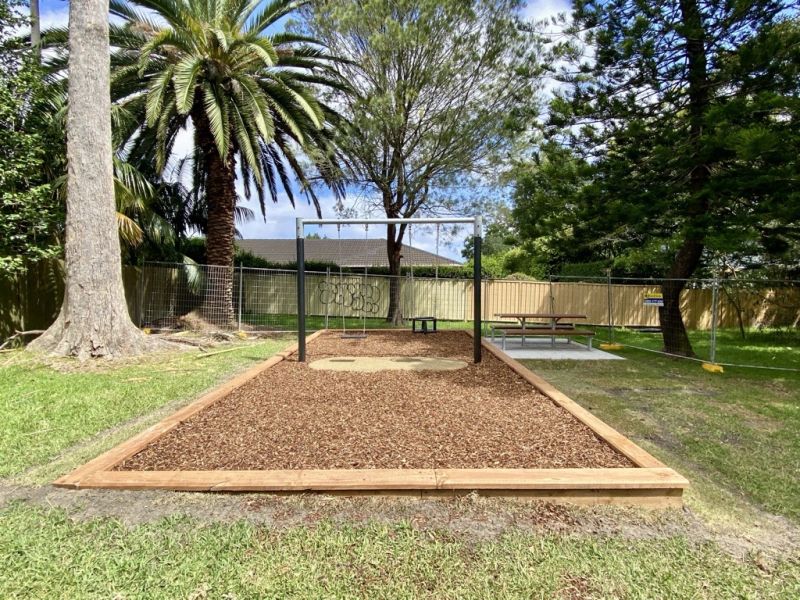 bucket swing on mulch in reserve