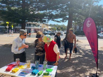 People at community engagement pop up